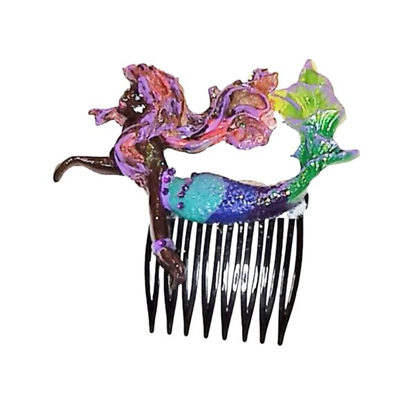 A hair comb with a mermaid and a dragon.