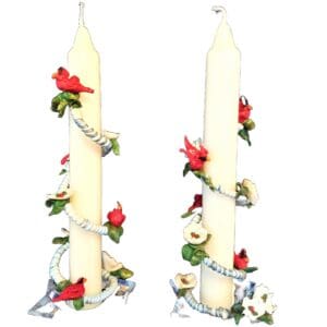 Decorative candles with flowers and birds.