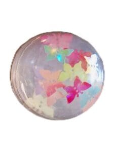 A white ball with many colorful butterflies on it.