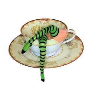 A cup of tea with a snake on it