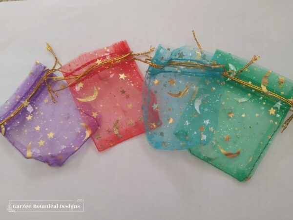 A group of four bags that are all different colors.